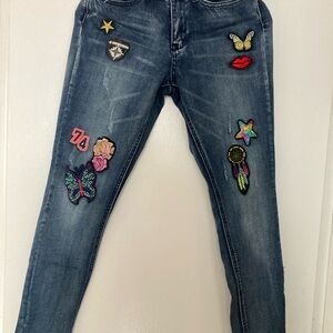 Indigo Rein size 11 ankle length skinny jeans with lots of fun patches